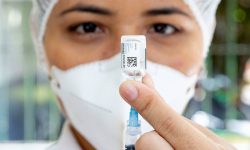 health-worker-covid-19-vaccine-in-hand-1500